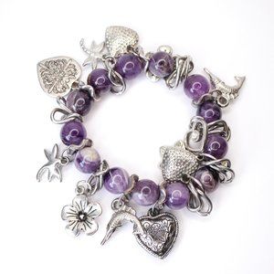 • the statement charm bracelet